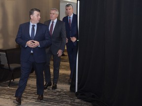 Prince Edward Island Premier Dennis King, Newfoundland and Labrador Premier Dwight Ball, and Nova Scotia Premier Stephen McNeil arrive for a press conference following the Atlantic Premiers Conference at the Emera Innovation Centre in St. John's on Monday. Jan. 13, 2020.