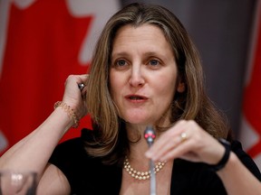 Deputy Prime Minister Chrystia Freeland attends a news conference as efforts continue to help slow the spread of coronavirus disease in Ottawa, March 23, 2020.