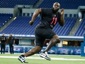 Oklahoma defensive lineman Neville Gallimore (DL11) goes through a workout drill during the 2020 NFL Combine at Lucas Oil Stadium in Indianapolis, Ind., on Saturday, Feb. 29, 2020.