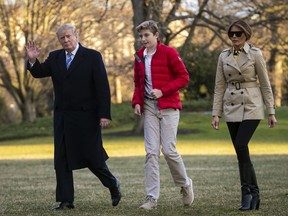 U.S. President Donald Trump, First Lady Melania Trump, and their son Barron Trump, arrive on the South Lawn of the White House, on March 10, 2019 in Washington, D.C. (Al Drago/Getty Images)