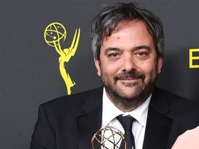 Adam Schlesinger poses with the Outstanding Original Music and Lyrics Award for 'Crazy Ex-Girlfriend' in the press room during the 2019 Creative Arts Emmy Awards on Sept. 14, 2019 in Los Angeles, Calif. (Amy Sussman/Getty Images)