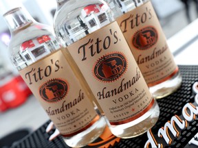 Bottles of Tito's Vodka are on display in this Oct. 12, 2019 file photo taken in New York City. (Cindy Ord/Getty Images for NYCWFF)