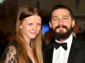 Mia Goth and Shia LeBeouf attend the closing night European Premiere gala red carpet arrivals for "Fury" during the 58th BFI London Film Festival at Odeon Leicester Square on October 19, 2014 in London, England.  (Anthony Harvey/Getty Images for BFI)