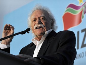 Greek resistance hero, politician and writer Manolis Glezos addresses party's supporters during a  pre-election rally of the  Left Coalition Party in central Athens Omonia square on May 3, 2012.