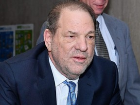 Harvey Weinstein arrives at the Manhattan Criminal Court, in New York City, on Feb. 24, 2020. Weinstein, who was convicted of rape last week, was expected to move from hospital to New York's Rikers Island jail complex on Thursday.