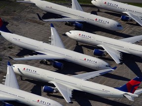 Delta Air Lines passenger planes are seen parked due to flight reductions made to slow the spread of coronavirus disease (COVID-19), at Birmingham-Shuttlesworth International Airport in Birmingham, Alabama, U.S. March 25, 2020.