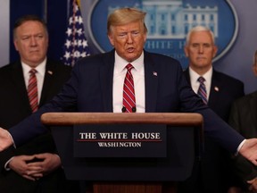 U.S. President Donald Trump addresses the coronavirus response daily briefing with members of the administration's coronavirus task force at the White House in Washington, U.S., March 20, 2020.