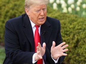 U.S. President Donald Trump speaks during a Fox News "virtual town hall" event on the coronavirus disease (COVID-19) outbreak in the Rose Garden of the White House in Washington, U.S., March 24, 2020.