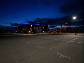 The parking lot outside of the Pepsi Center in Denver is empty after the game between the Colorado Avalanche and Vancouver Canucks was cancelled after the suspension of the NHL season due to the novel coronavirus.