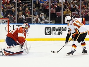 Calgary Flames left wing Johnny Gaudreau takes penalty shot on Florida Panthers goaltender Sam Montembeault during the first period at BB&T Center in Sunrise, Fla., on Sunday, March 1, 2020.