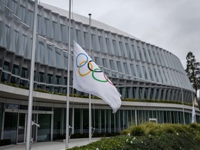 The headquarters of the International Olympic Committee is seen in Lausanne, Switzerland, Sunday, March 22, 2020, as doubts increase over whether Tokyo can safely host the Summer Games amid the spread of COVID-19.