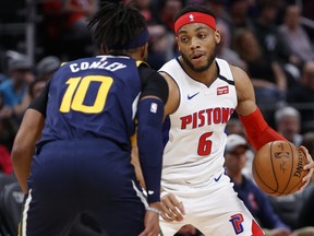 Detroit Pistons guard Bruce Brown (6) dribbles the ball against Utah Jazz guard Mike Conley (10) at Little Caesars Arena. (Rick Osentoski-USA TODAY Sports)