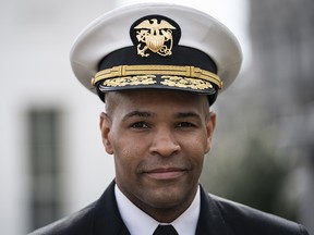 U.S. Surgeon General Jerome Adams walks outside the West Wing of the White House on his way to do a television interview with Fox News on March 5, 2020 in Washington, D.C.