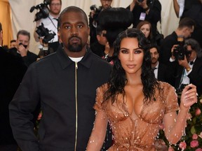 In this file photo taken on May 6, 2019, Kanye West and Kim Kardashian arrive for the 2019 Met Gala at the Metropolitan Museum of Art in New York City.