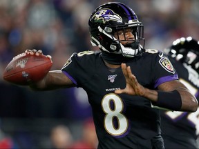 Quarterback Lamar Jackson of the Baltimore Ravens drops back to pass against the New York Jets at M and T Bank Stadium on December 12, 2019 in Baltimore. (Scott Taetsch/Getty Images)