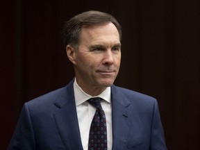 Finance Minister Bill Morneau waits to appear before the House of Commons Finance committee in Ottawa, Wednesday, Feb. 19, 2020.