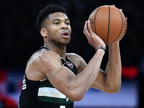 Milwaukee Bucks forward Giannis Antetokounmpo shoots during a game against the Charlotte Hornets at The AccorHotels Arena in Paris on January 24, 2020. (FRANCK FIFE/AFP via Getty Images)