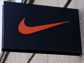 The Nike swoosh logo is pictured on a store in New York City, Sept. 4, 2018.