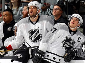 In this Jan. 29, 2017, file photo, Alex Ovechkin of the Washington Capitals and Sidney Crosby of the Pittsburgh Penguins look on during the 2017 Honda NHL All-Star Tournament Final between the Pacific Division All-Stars and the Metropolitan Division All-Stars at Staples Center in Los Angeles.