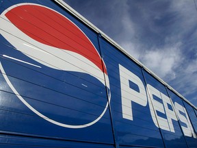 This May 30, 2012 photo shows the Pepsi logo on a delivery truck in Springfield, Ill.
