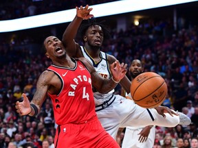 Denver Nuggets forward Jerami Grant collides with Raptors forward Rondae Hollis-Jefferson during the second half at the Pepsi Center on Sunday, March 1, 2020.