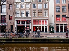 This picture taken on Friday, March 13, 2020, shows a street in Amsterdam's Red Light District.