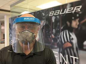 A man wears a protective mask in a handout photo. Canadian hockey equipment manufacturer Bauer is offering to modify its production line to make protective visors for doctors, nurses and first responders. T(HE CANADIAN PRESS/HO-Bauer-Ivan Labonte)