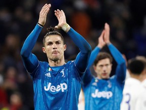 Juventus' Cristiano Ronaldo applauds fans at the end of a game against Olympique Lyonnais. (REUTERS/Eric Gaillard/File Photo)