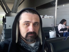 A Ukrainian citizen Anton Scherbyna poses for a selfie at the Vnukovo International Airport in Moscow, March 25, 2020. (Anton Scherbyna/Handout via REUTERS)