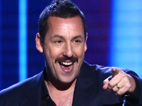 Adam Sandler accepts the best male lead award for "Uncut Gems" onstage during the 2020 Film Independent Spirit Awards on Feb. 8, 2020, in Santa Monica, Calif.