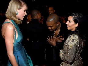 In this Feb. 8, 2015, file photo, recording artists Taylor Swift, Kanye West and TV personality Kim Kardashian attend The 57th Annual Grammy Awards at the STAPLES Center in Los Angeles.