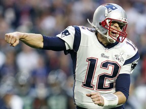 Tom Brady of the New England Patriots celebrates after a touchdown against the Seattle Seahawks during Super Bowl XLIX at University of Phoenix Stadium on February 1, 2015 in Glendale, Arizona. (Christian Petersen/Getty Images)