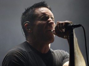 Trent Reznor of Nine Inch Nails performs at Rexall Place in Edmonton, on Nov. 24, 2013.