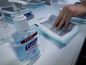 A bottle of Purell hand sanitizer sits next to campaign canvass packets at a field office for Democratic 2020 U.S. presidential candidate and U.S. Senator Elizabeth Warren (D-MA) in Graniteville, South Carolina, U.S., February 28, 2020.