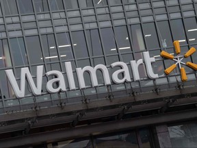 In this file photo taken on March 1, 2019 the Walmart logo is seen on a store in Washington. (NICHOLAS KAMM/AFP via Getty Images)