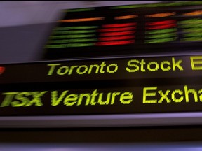 The TSX ticker is shown in Toronto on May 10, 2013. (THE CANADIAN PRESS/Frank Gunn)