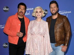 Lionel Richie, Katy Perry and Luke Bryan attend the premiere event for "American Idol" hosted by ABC at Hollywood Roosevelt Hotel on February 12, 2020 in Hollywood, California.