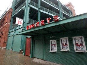 A ticket window outside of Fenway Park is closed on March 19, 2020 in Boston, Massachusetts. The NBA, NHL, NCAA and MLB have all announced cancellations or postponements of events because of the COVID-19.