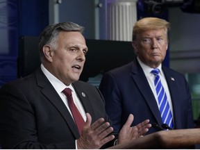 William Bryan, head of science and technology at the Department of Homeland Security speaks while U.S. President Donald Trump listens during the daily briefing of the coronavirus task force at the White House on April 23, 2020 in Washington, DC.