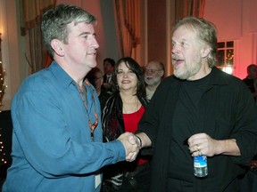 Winnipeg Mayor Glen Murray meets with legendary rocker Randy Bachman at the Winnipeg Junos social at the Hotel MacDonald in 2005.