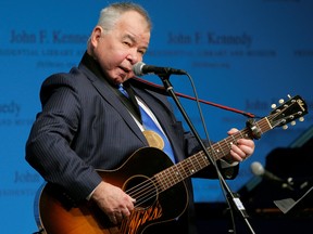 Musician John Prine performs after accepting his PEN New England Song Lyrics of Literary Excellence Award during a ceremony at the John F. Kennedy Library in Boston, Mass., Sept. 19, 2016.  (REUTERS/Brian Snyder/File Photo)