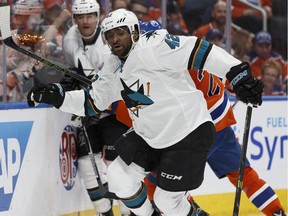San Jose's Joel Ward (42) chases a puck during the second period of a Stanley Cup playoffs game between the Edmonton Oilers and the San Jose Sharks at Rogers Place in Edmonton on Wednesday, April 12, 2017.