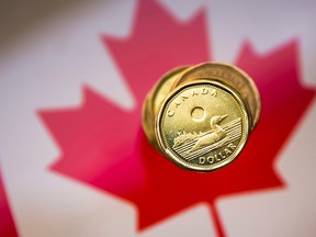 A Canadian dollar coin, commonly known as the "Loonie", is pictured in this illustration picture taken in Toronto, Jan. 23, 2015. (REUTERS/Mark Blinch/File Photo)