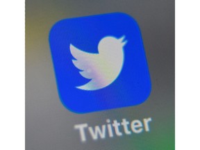 In this file photo taken on Sept. 4, 2019, a picture shows the Twitter logo of the displayed on a smartphone screen, in Lille, northern France.