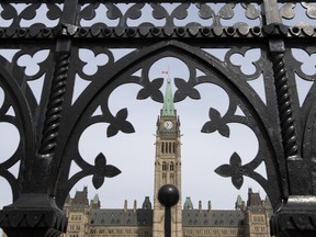 The Parliament buildings are seen in Ottawa, Monday, April 27, 2020. In addition to one limited in person session, Parliament is scheduled to begin sitting virtually twice a week Tuesday in response to the COVID-19 pandemic.