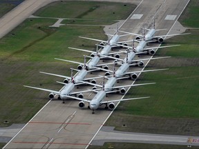 American Airlines passenger planes crowd a runway where they are parked at Tulsa International Airport in Tulsa, Oklahoma, March 23, 2020. (REUTERS/Nick Oxford/File Photo)