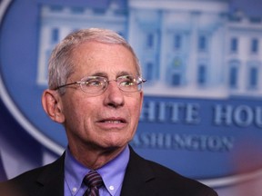 National Institute of Allergy and Infectious Diseases Director Anthony Fauci listens during the daily coronavirus briefing in the Brady Press Briefing Room at the White House in Washington, D.C., April 9, 2020.