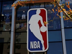 An NBA logo is seen on the facade of its flagship store at the Wangfujing shopping street in Beijing, China, Oct. 8, 2019.