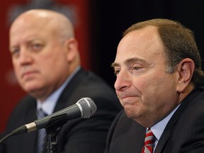 NHL commissioner Gary Bettman (right) and deputy commissioner Bill Daly have been providing the league governors with a bi-weekly update on league issues and the latest from the medical experts they've been working with regarding COVID-19. (John Locher/The Associated Press)