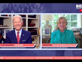 Democratic U.S. presidential candidate Joe Biden smiles as former Secretary of State and 2016 Democratic presidential nominee Hillary Clinton endorses him for president in a video screengrab made during an online town hall about the impact of COVID-19 disease on women run from Biden's home in Wilmington, Delaware, Tuesday, April 28, 2020.